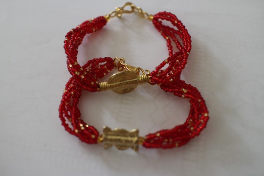 pearl bracelets and akan weights