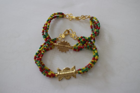 pearl bracelets and akan weights