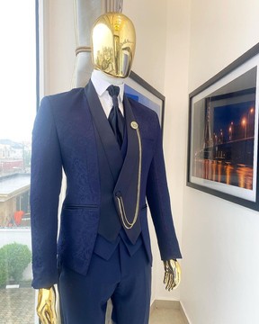 A Reloaded “Lugard” midnight blue blazers suit.