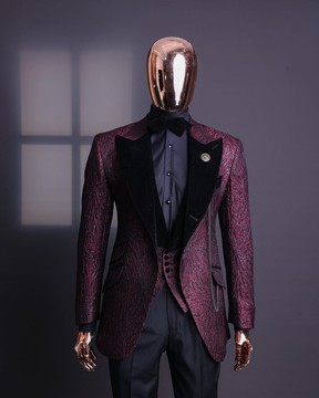 A burgundy, black broom splashed metallic jacquard, knitted, peak lapel tuxedo suit