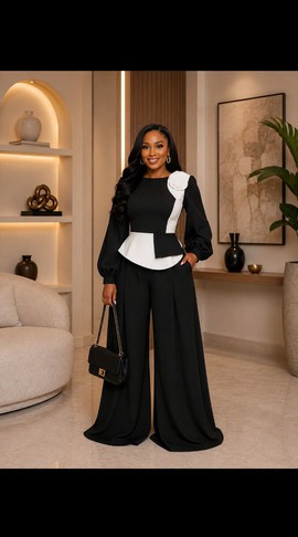 Ensemble pour femme composé d’un haut péplum noir et blanc et d’un pantalon à jambes larges avec détail de rosette