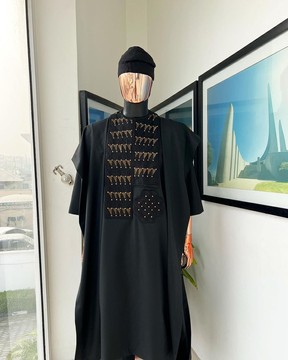 A charcoal black, separated square in triangle embrodery details agbada