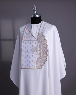 A white, sided pagoda embroidery details agbada