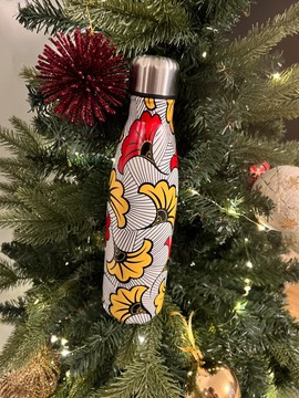 “Dancing Flowers” insulated bottle with African wax patterns, Pince de Joie