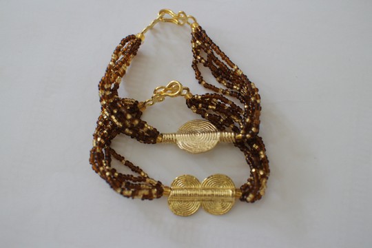 pearl bracelets and akan weights