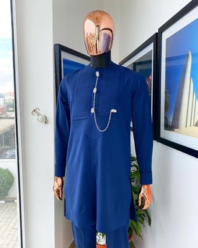 A navy blue men’s Etibo with a sliver accessories detailing.