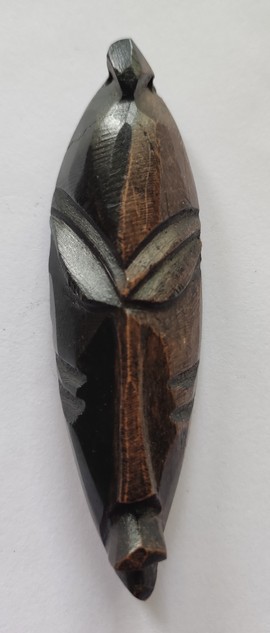 ebony wood fridge magnet carved in the shape of an African mask - fridge magnet