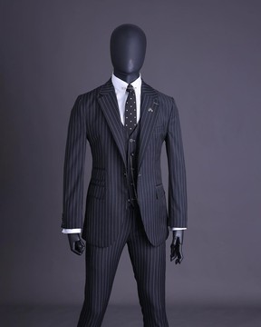 A charcoal black &amp; ivory pencil stripe, notch lapel, knitted one button suit