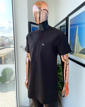 A brown, front flap with embrodery details African traditional kaftan native.