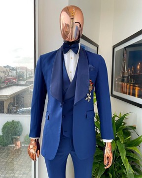 A sapphire blue shawl lapel suit