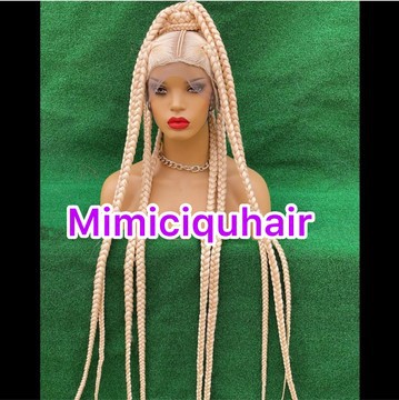 Jumbo knotless braids with cross detail
