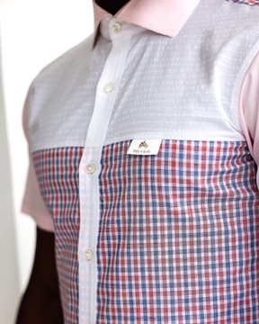 A plaid check, pink and white seersucker mix casual shirt.