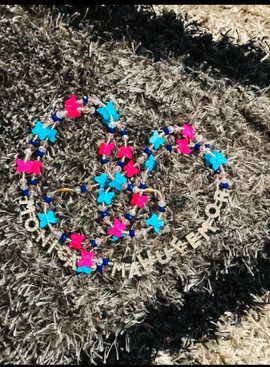 Customized waist beads with your name.