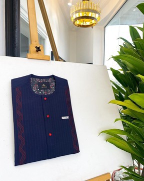 A midnight blue, red pencil stripe, senator kaftan native.