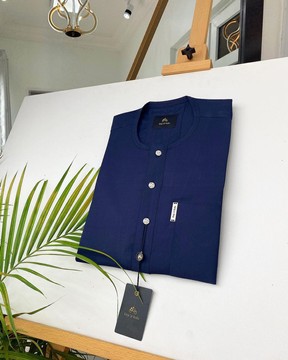 An Midnight Blue Kaftan with ABV diamond shape Australian Swarovski button.