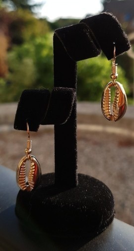 Gold cowrie earrings