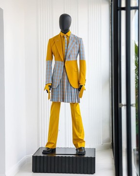 A “Square Shattered” yellow check blue mix peak lapel suit