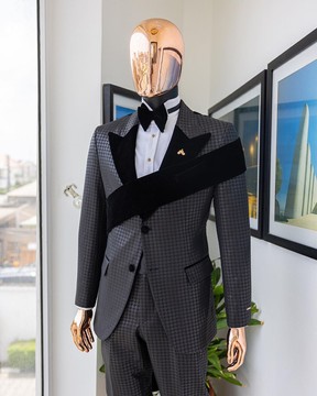 An “octopus” black inverted square patterned jacquard tuxedo with left sachet black velvet suit