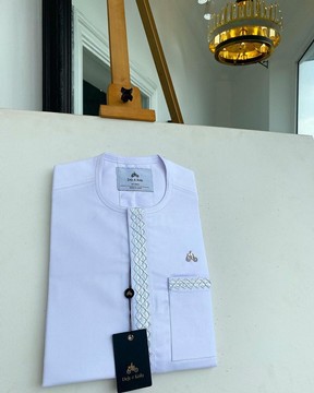 A white, Flap with embroidery details African traditional senator kaftan native.