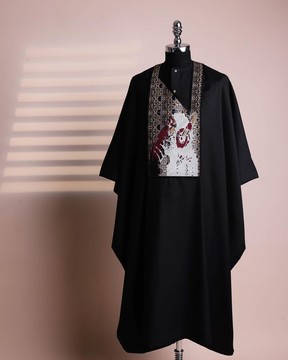 A charcoal black, “thinking APE ” embroidery details agbada