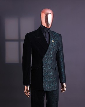 An Emerald green &amp; black “rival” 1/2 cut ocean element peak lapel suit