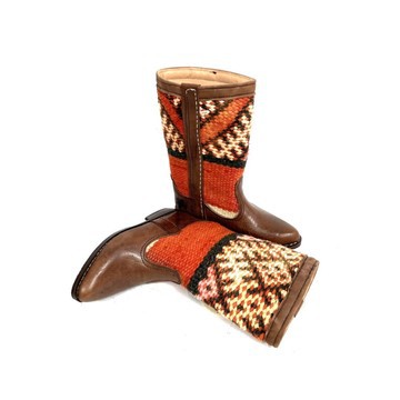 High-end handmade genuine leather and kilim boot.