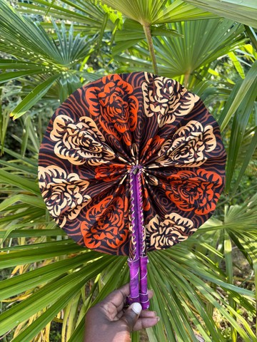 Wax and leather fan in its pouch