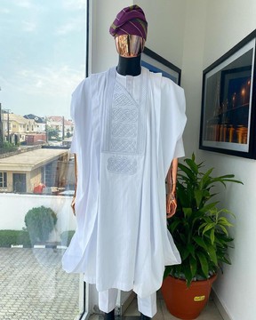 A White dotted round and interwoven line embroidery agbada