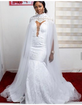 White lace wedding dress with cape
