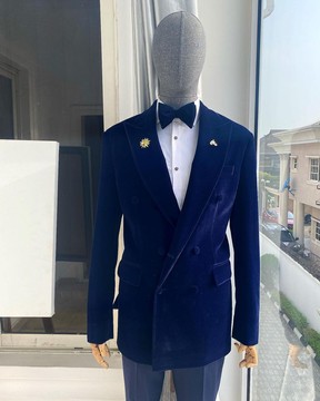 A peak lapel double breasted soaked Italian velvet blazer suit