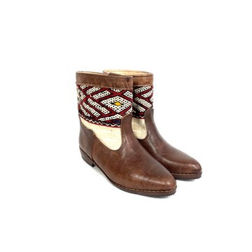 High-end handmade genuine leather and kilim boot.