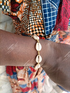 Brass shell bangle, African cowrie shell bracelet , statement bracelet