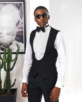 A U-Cut waistcoat with layered back cut.