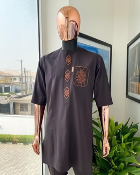 An Umber brown, 3d precision anchor embrodery flap &amp; pocket detailing african Kaftan