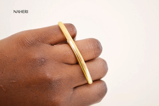 African brass ring horizontal bar