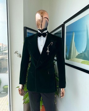 A Sacramento green soaked velvet peak lapel single button double breasted suit
