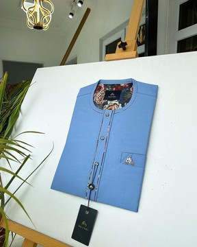 A Skye blue men’s tailored kaftan.