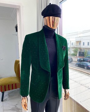An emerald green velvet dinner shawl lapel tuxedo suit