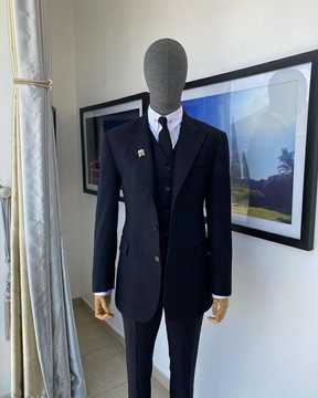 Costume Eton Super 130's en tissu noir anthracite à revers en pointe
