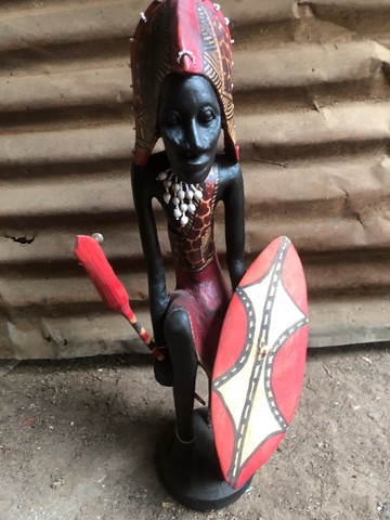 Wooden Maasai war warrior curving