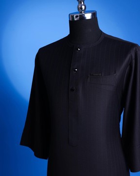 A charcoal black, pen stripe, front flap with Swarovski button African kaftan native.