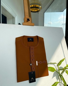A Carmel brown, flap &amp; pocket undulating with connected lane embroidery detailing kaftan