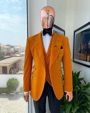 A hand knitted soaked Italian velvet ochre yellow peak lapel suit