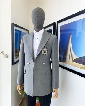 A Cloud Grey Peak lapel, one button double breasted blazer