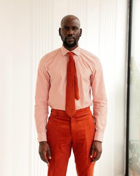A vermillion orange and ivory stripe, English spread collar business shirt.