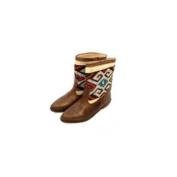 High-end handmade genuine leather and kilim boot.