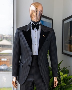 A black inverted square patterned metallic jacquard tuxedo suit