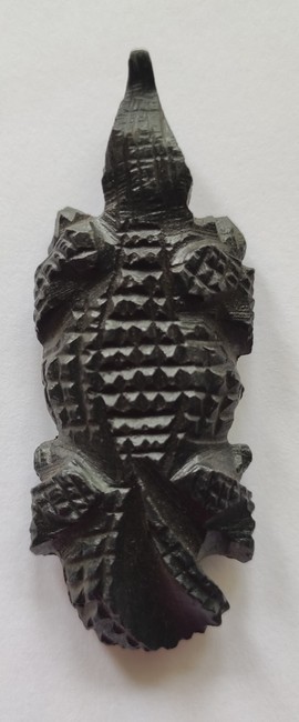 ebony wood fridge magnet carved in the shape of a crocodile - fridge magnets