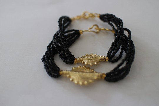 pearl bracelets and akan weights