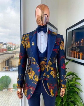 The “mandarin” gold, navy blue &amp; red splashed jacquard peak lapel suit